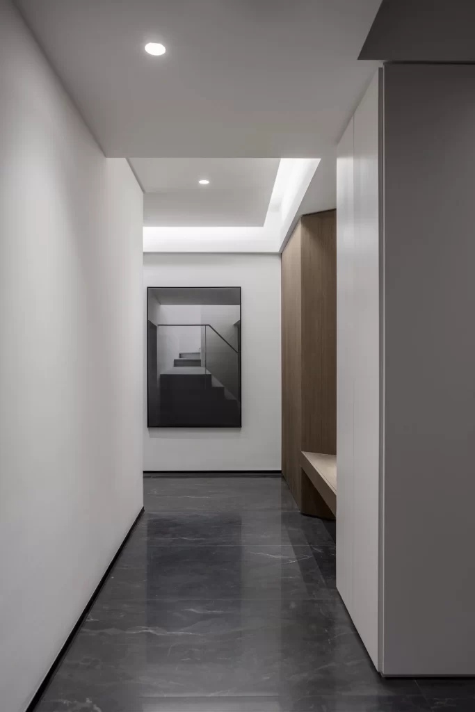 Modern Minimalist Hallway Neutral Dark Flooring White Walls