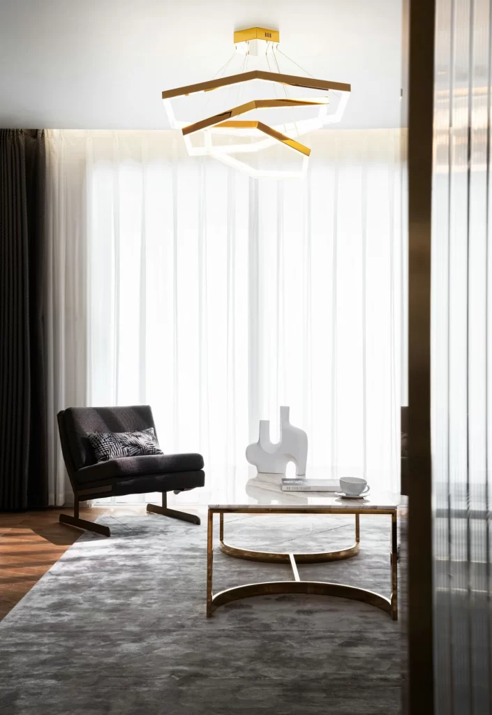 Modern Minimalist Living Room Neutral Gold Accents Geometric Light Fixtures
