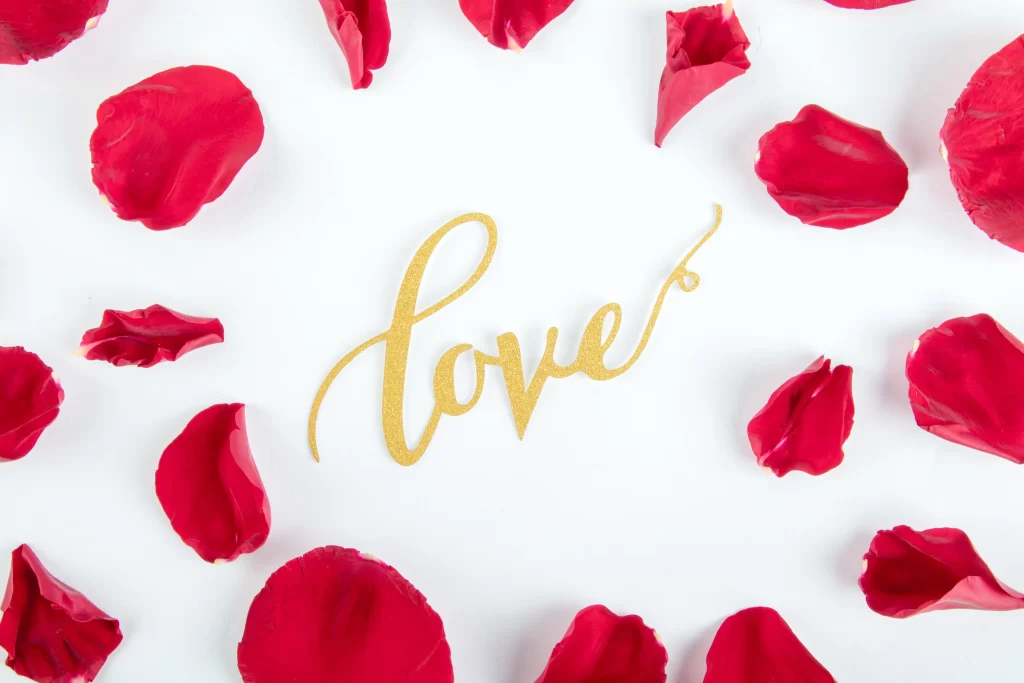 Rose Petals Red Gold Lettering White Background