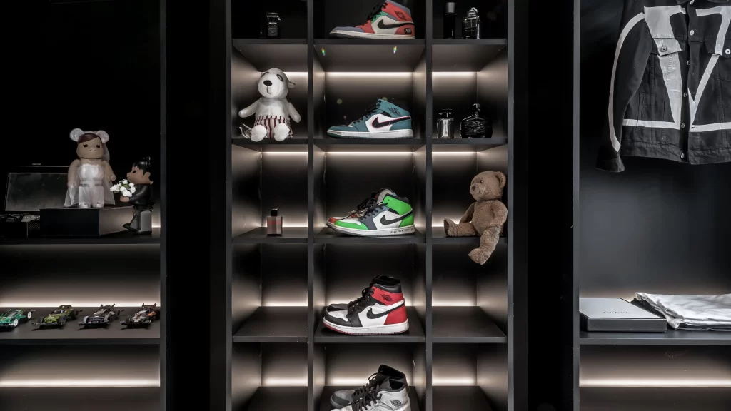 Shoe Display Black Shelving Neon Lighting Minimalist