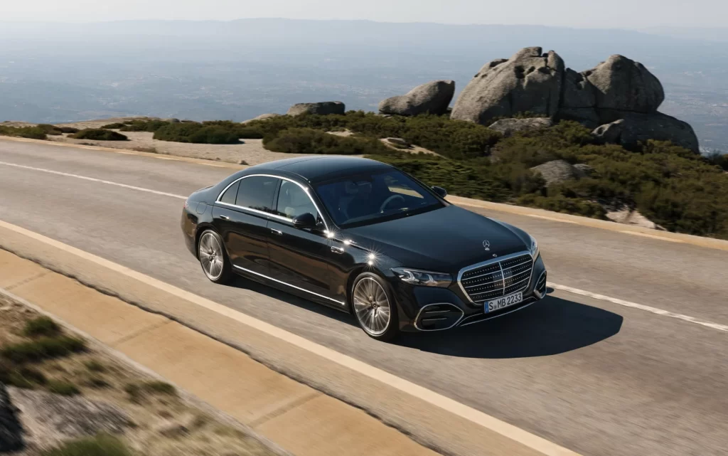 Sleek Midnight Black Car on Curved Road