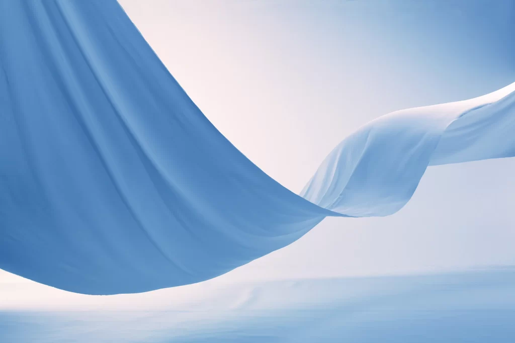 Soft Blue Fabric Flowing in the Wind