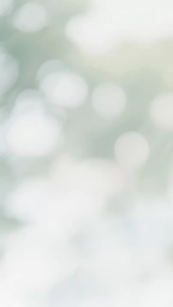Soft Green and White Bokeh Background