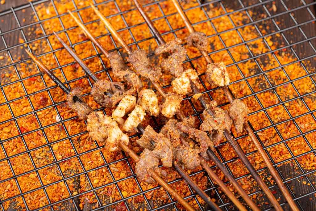 Spicy Beef and Chicken Skewers Charred Golden Brown