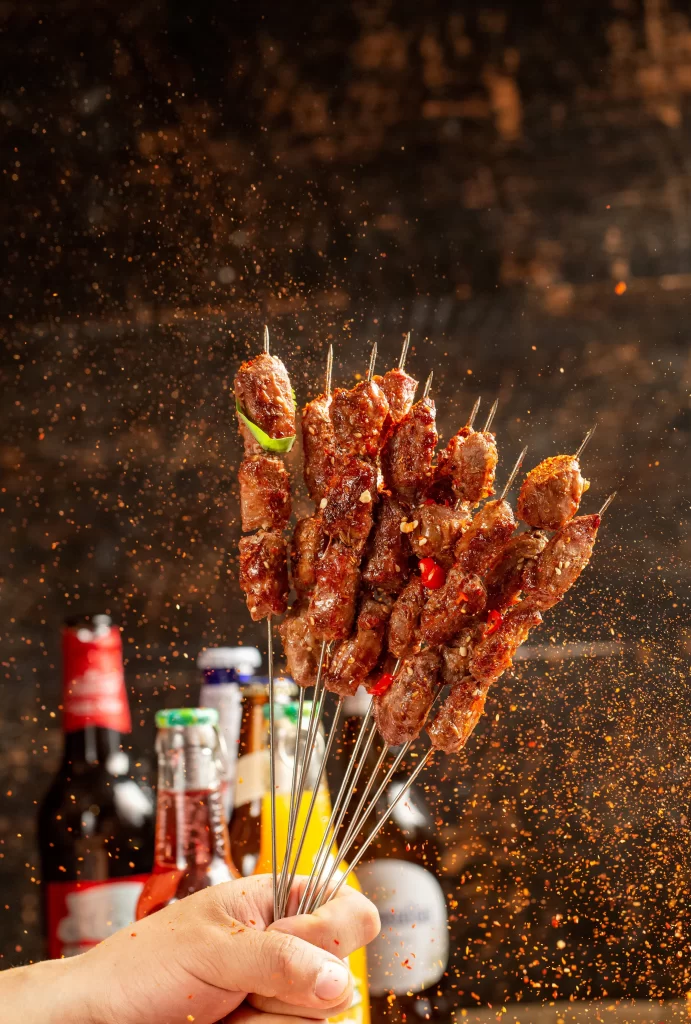 Spicy Beef Skewers Red Chili Charred Crust Hand Held