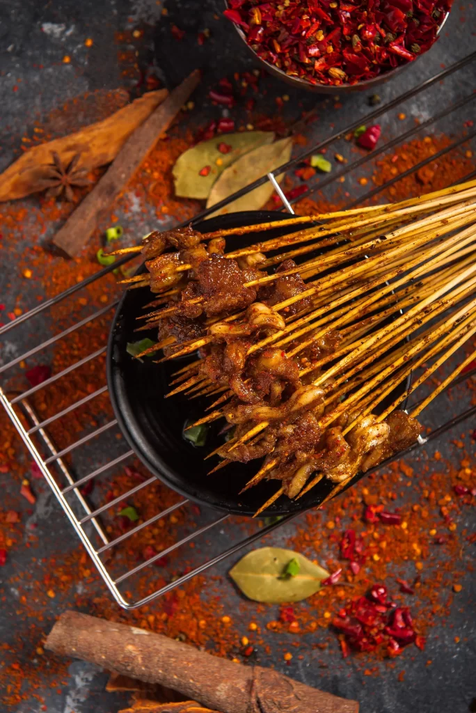 Spicy Beef Skewers Red Chili Garnish Charred Crust
