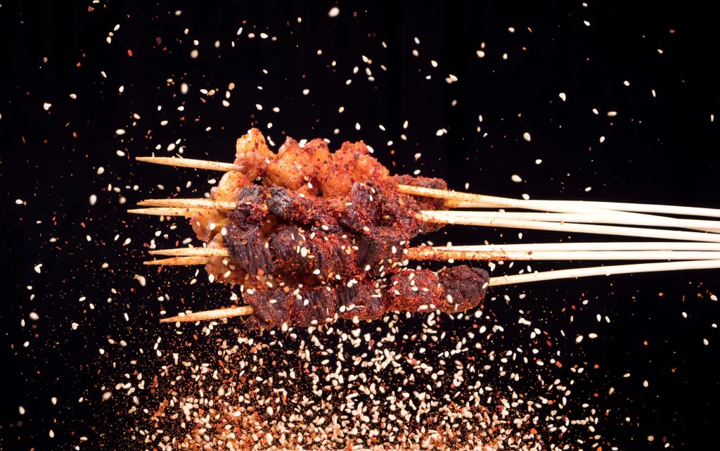 Spicy Beef Skewers Sesame Seeds Charred Crust