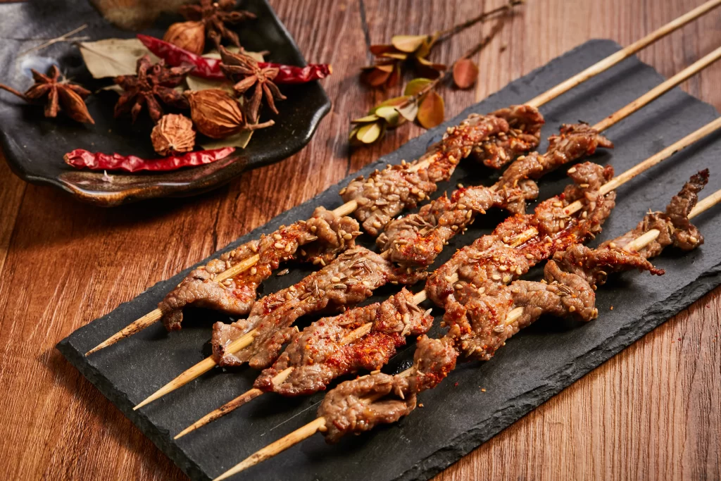 Spicy Beef Skewers Sesame Seeds Red Chili Powder Black Slate