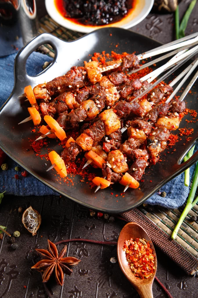 Spicy Beef Skewers with Carrots and Sesame Seeds