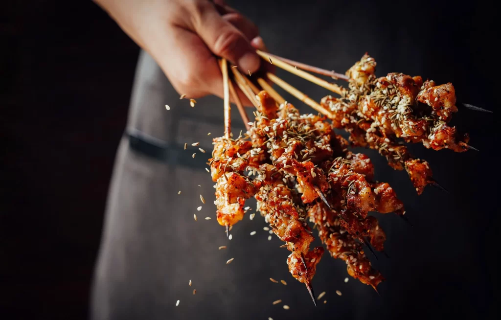 Spicy Chicken Skewers Sesame Seeds Charred Crust