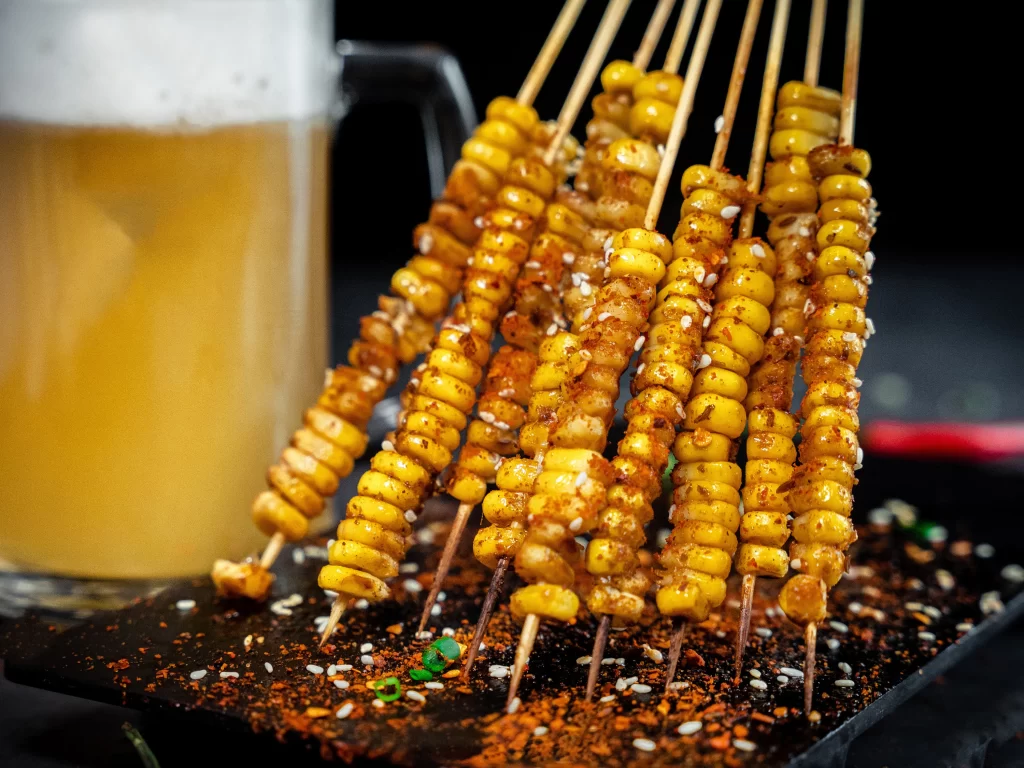 Spicy Corn Skewers with Sesame and Chili Flakes
