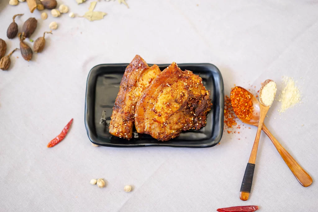 Spicy Grilled Chicken Drumsticks with Sesame Garnish