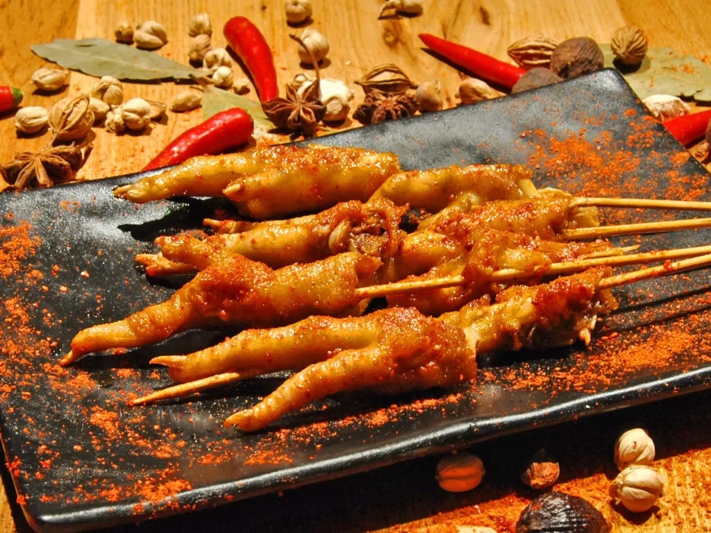 Spicy Grilled Chicken Feet Red Pepper Powder Black Plate