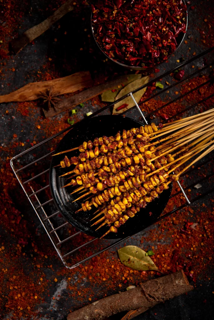 Spicy Grilled Corn Skewers Red Chili Garnish