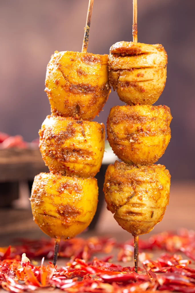 Spicy Grilled Eggplant Skewers Golden Crust Red Chili Garnish