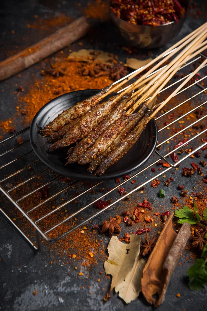 Spicy Grilled Fish Skewers Red Chili Powder Black Plate