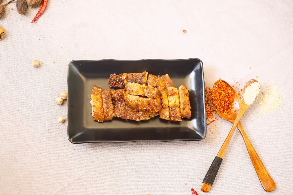 Spicy Grilled Pork Ribs Golden Brown Crispy Plated
