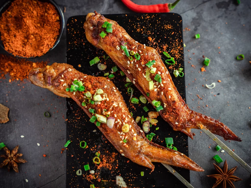 Spicy Grilled Pork Ribs with Green Onion Garnish