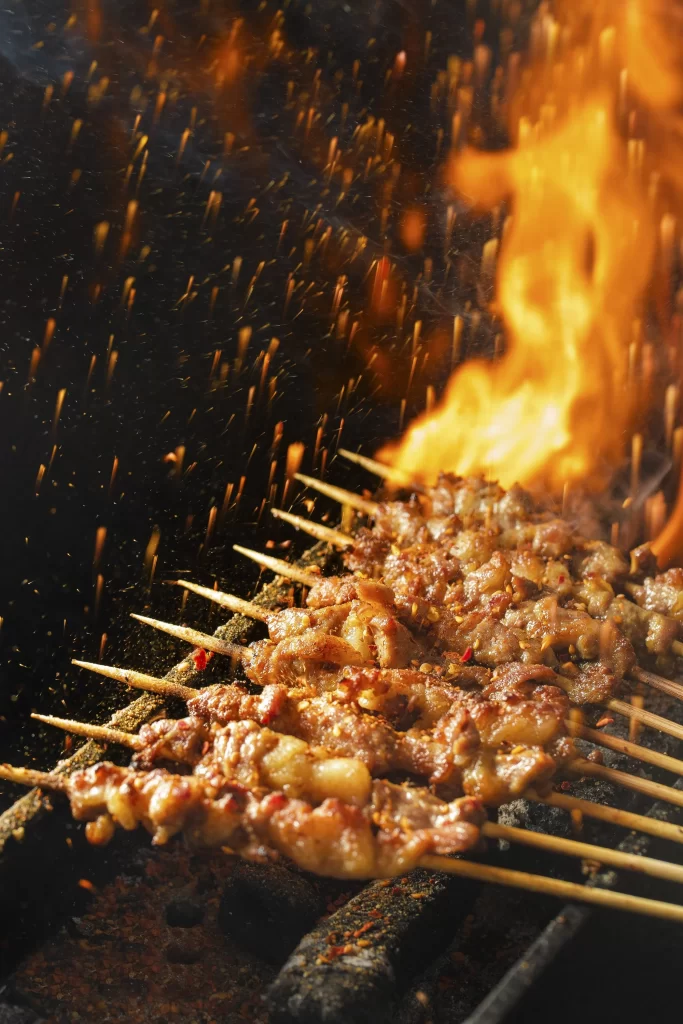 Spicy Grilled Pork Skewers Charred Crust Open Flame