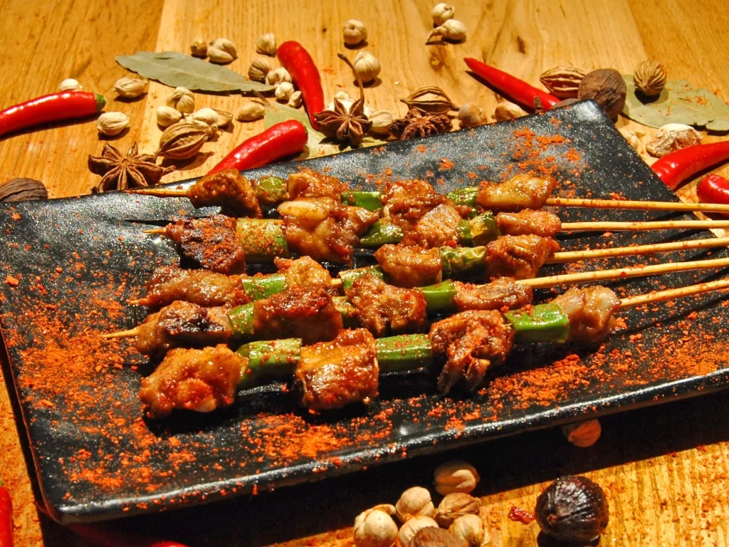 Spicy Grilled Pork Skewers Green Peppers Red Paprika Black Plate