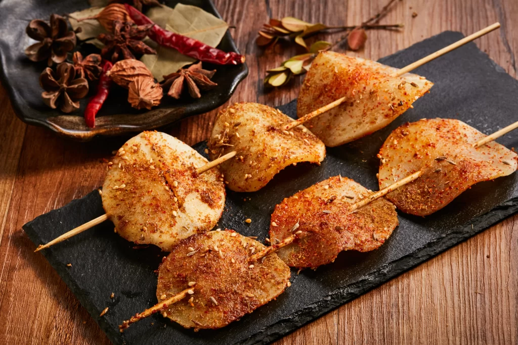 Spicy Grilled Potato Skewers with Seasoning and Sesame