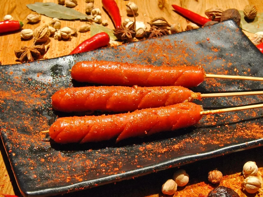 Spicy Grilled Sausage Skewers Red Paprika Black Plate