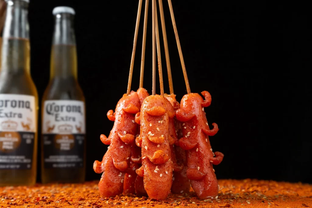 Spicy Grilled Sausages with Chili Sauce and Sesame