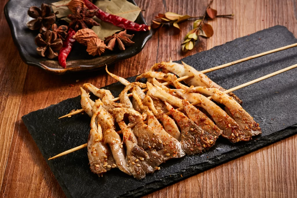 Spicy Grilled Squid Skewers with Sesame and Chili Flakes