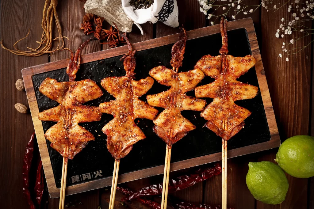 Spicy Grilled Squid Skewers with Sesame Garnish