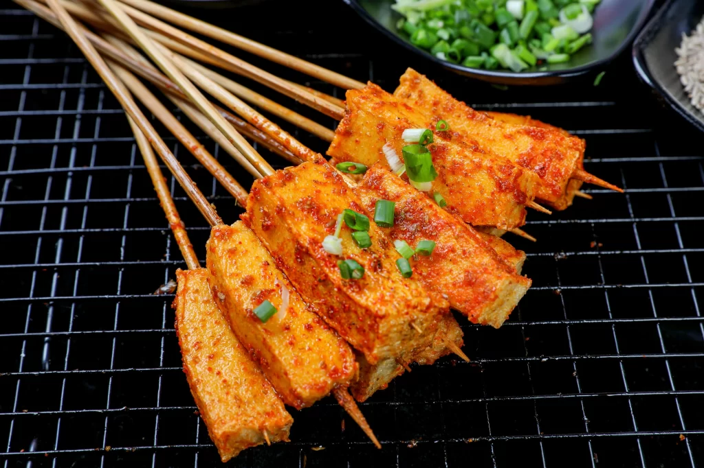 Spicy Grilled Tofu Skewers Fresh Green Onion Garnish