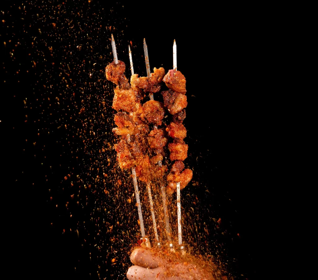 Spicy Lamb Skewers Charred Crust Red Pepper Flakes