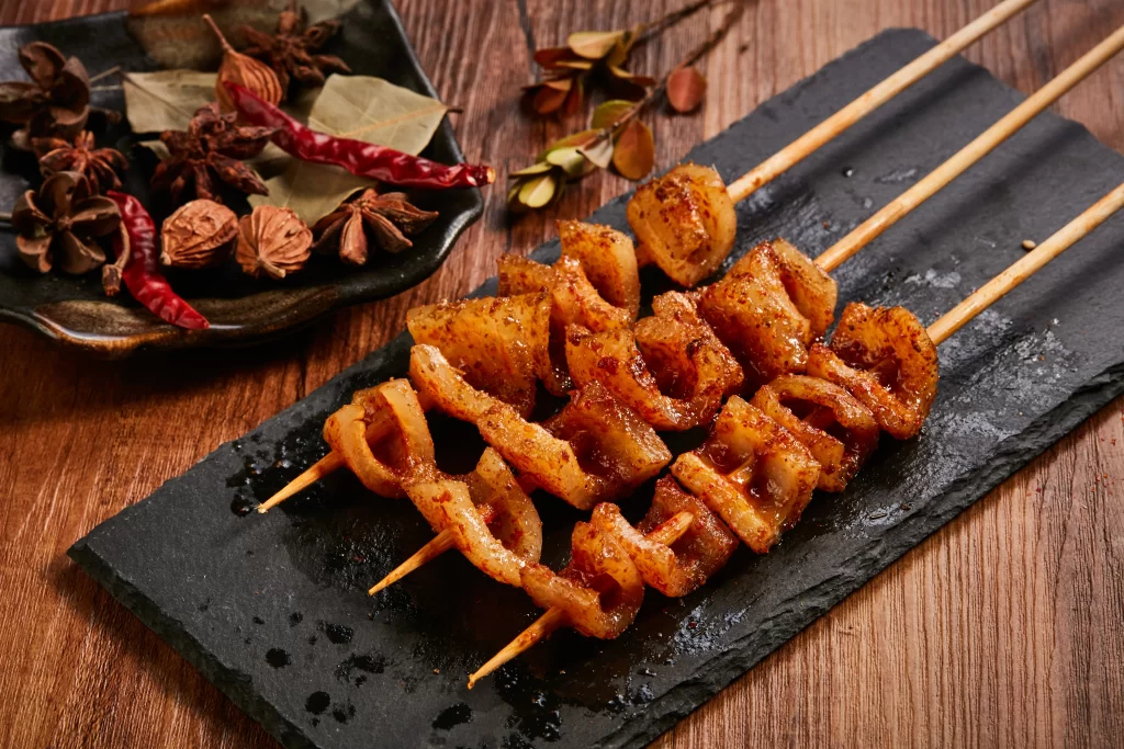 Spicy Pork Skewers Charred Crust Black Slate Platter