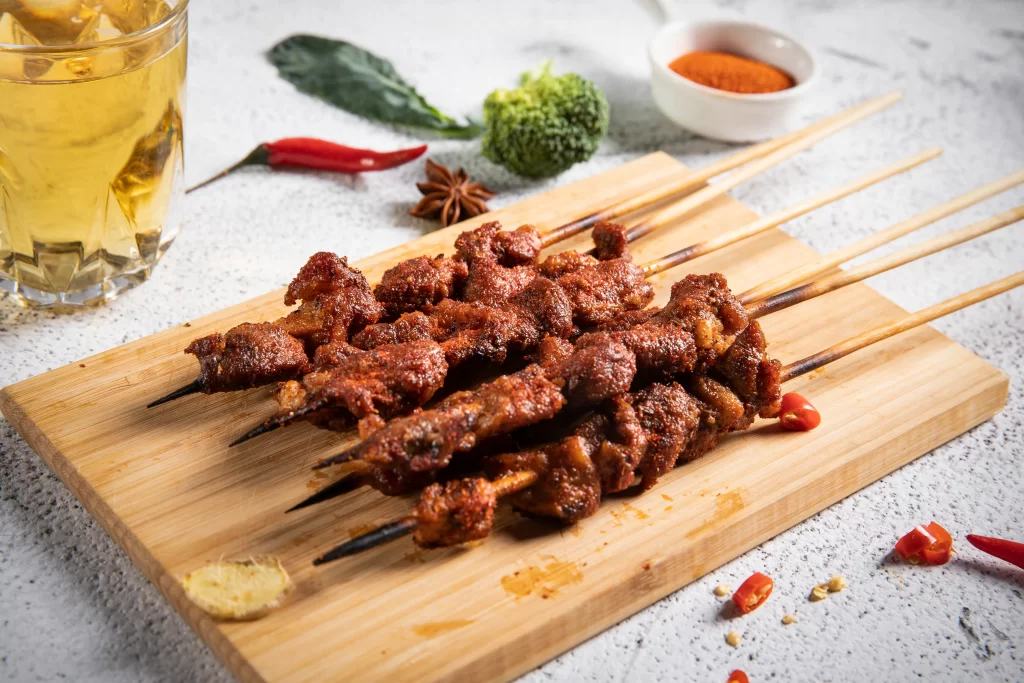 Spicy Pork Skewers Charred Crust Golden Brown Garnish