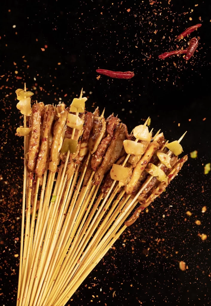 Spicy Pork Skewers Charred Garlic Ginger Black Background