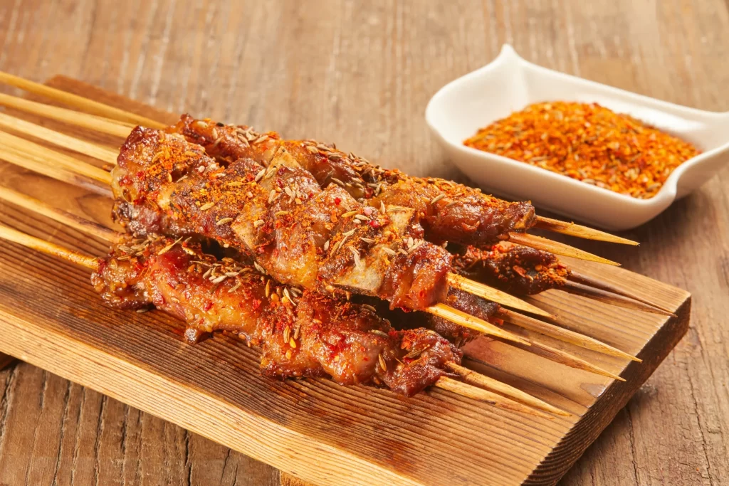 Spicy Pork Skewers Cumin Chili Golden Crust Plated