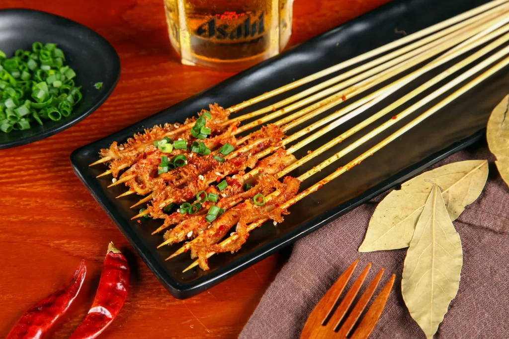 Spicy Pork Skewers Fresh Green Onions Black Plate