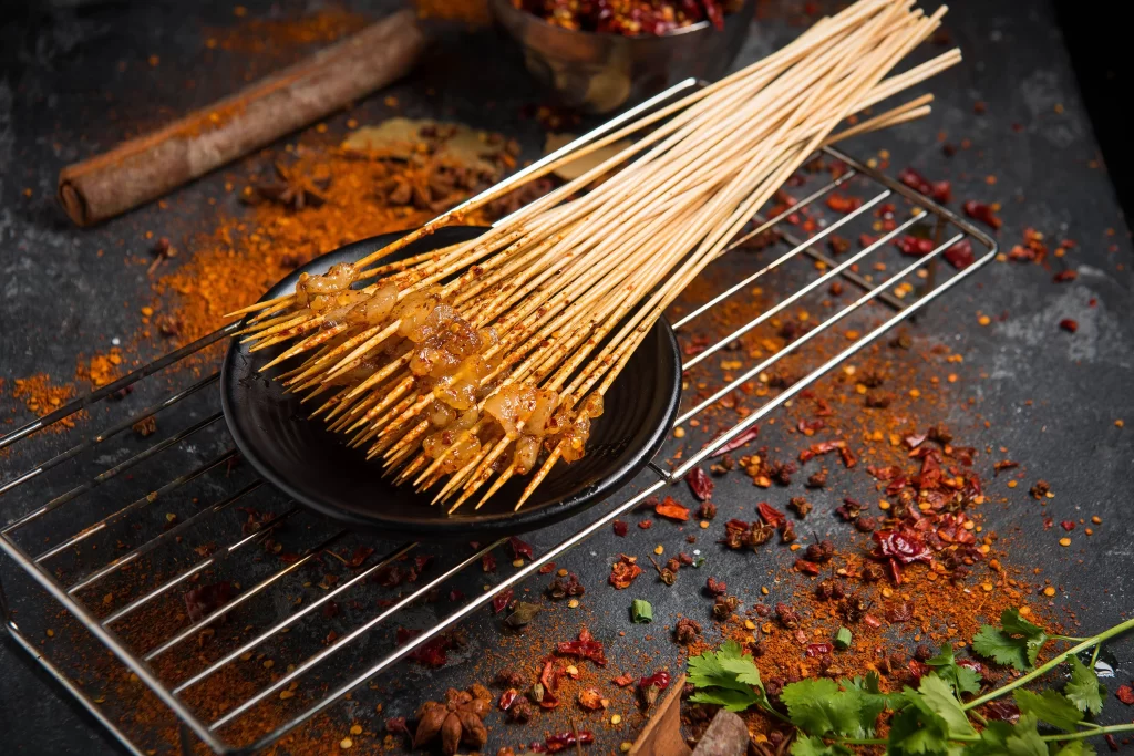 Spicy Pork Skewers Golden Brown Crispy Charred Close Up