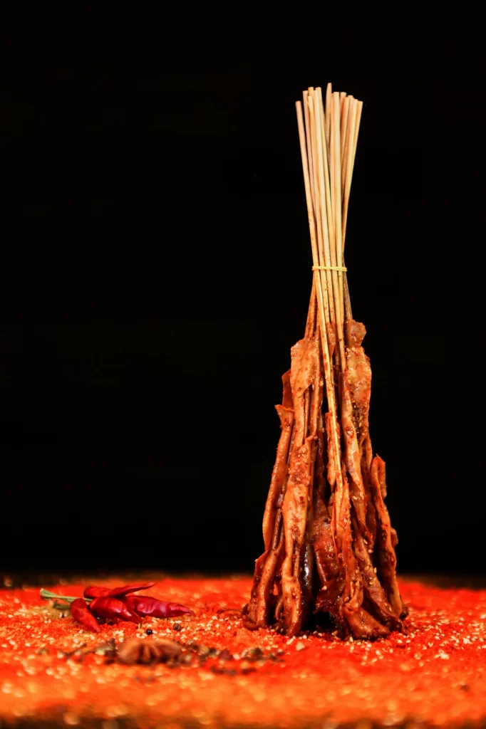 Spicy Pork Skewers Red Chili Garnish Charred Crust