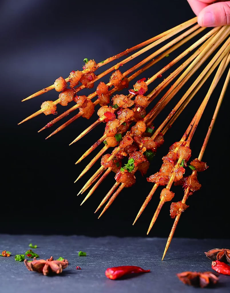 Spicy Pork Skewers Red Chili Garnish Golden Brown