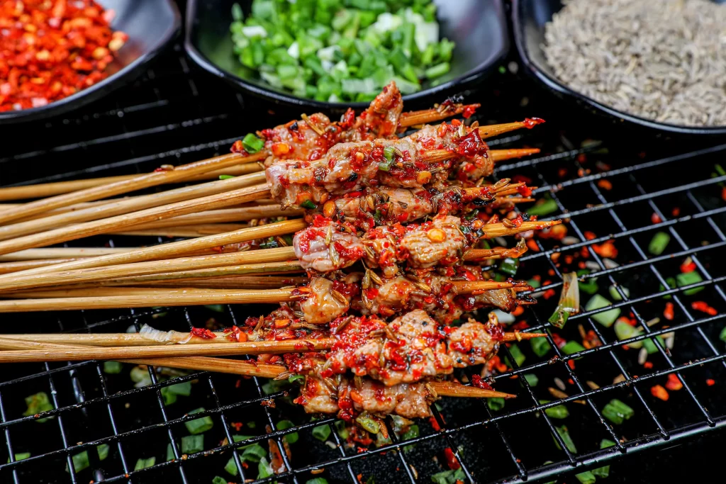 Spicy Pork Skewers Red Chili Sauce Charred Edges