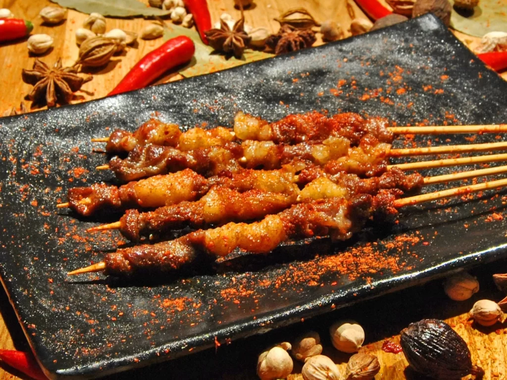 Spicy Pork Skewers with Crispy Char and Red Pepper Flakes
