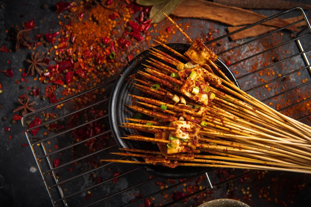 Spicy Tofu Skewers Red Chili Powder Green Onion Garnish