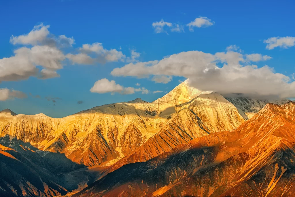sunset golden amber ridge clouds