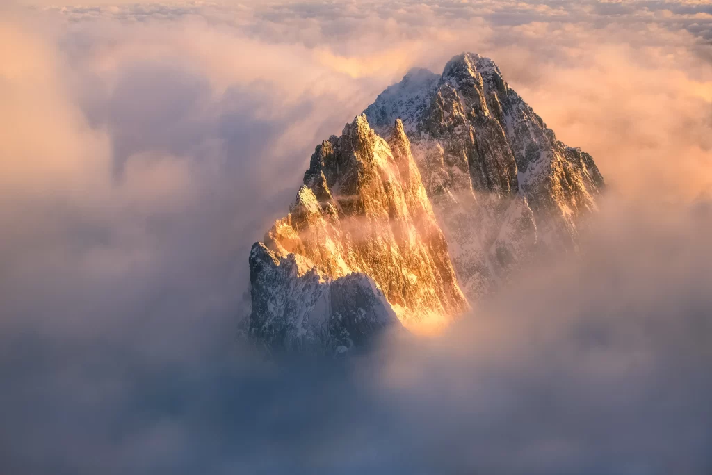 sunset golden amber ridge clouds aerial