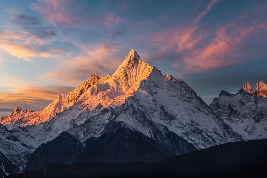 sunset golden amber snow peak ridge clouds orange