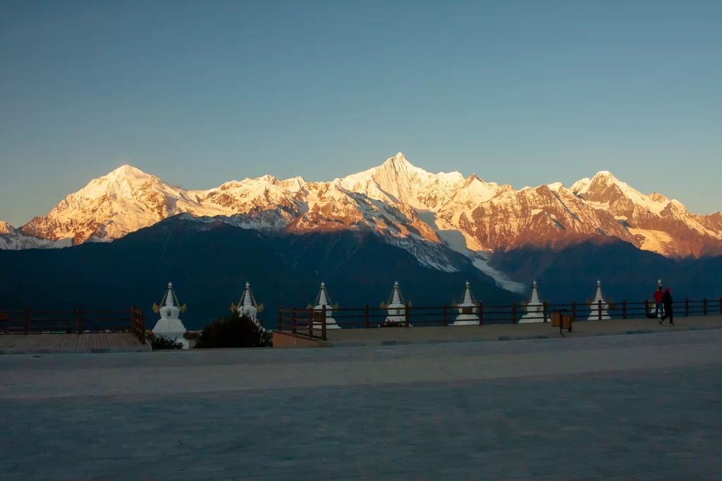 sunset golden amber snow peak ridge wide panoramic cyan