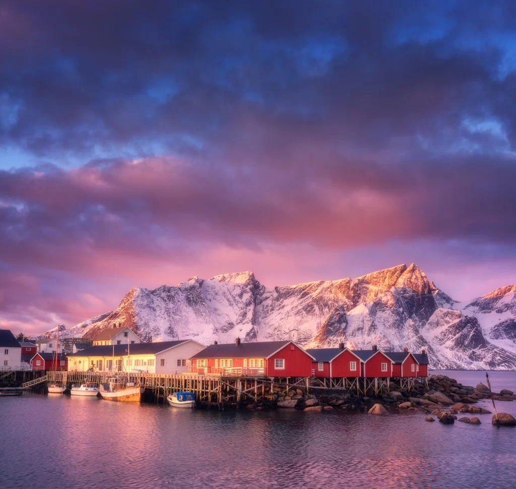 sunset golden amber snow peak lake reflection clouds