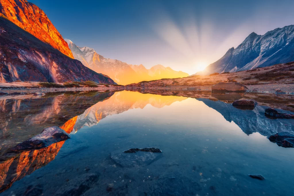 sunset golden orange blue mountain reflection tranquil serene