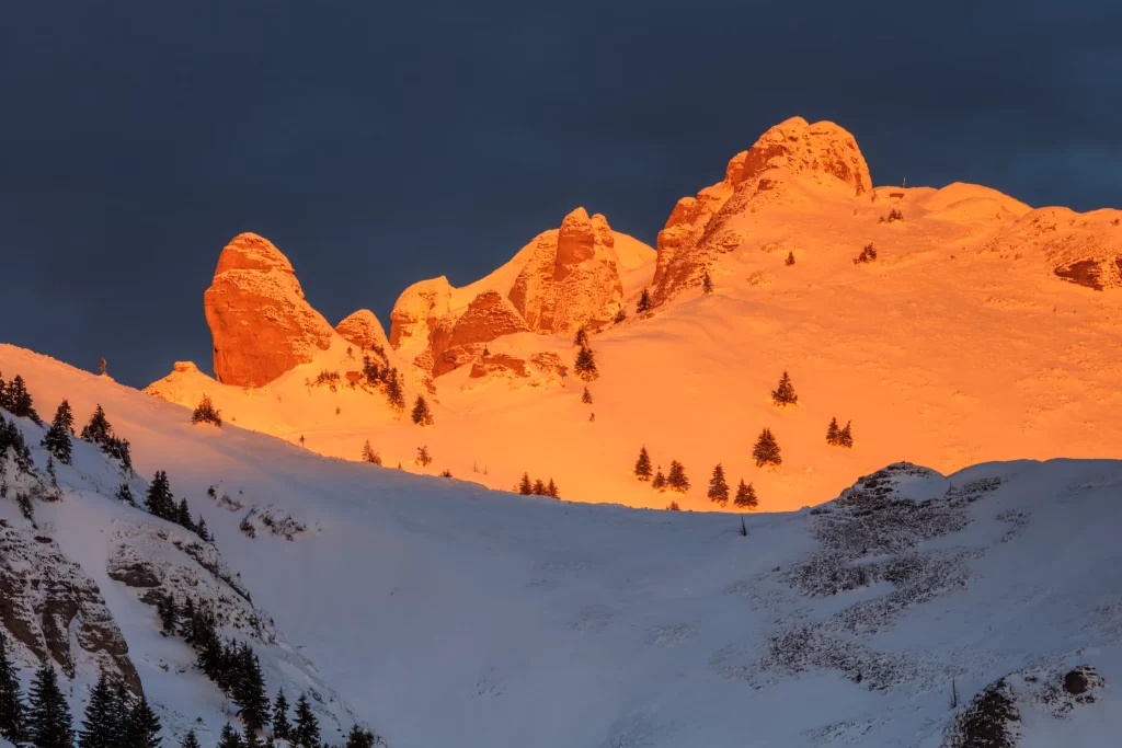 sunset golden orange snow peak ridge twilight blue
