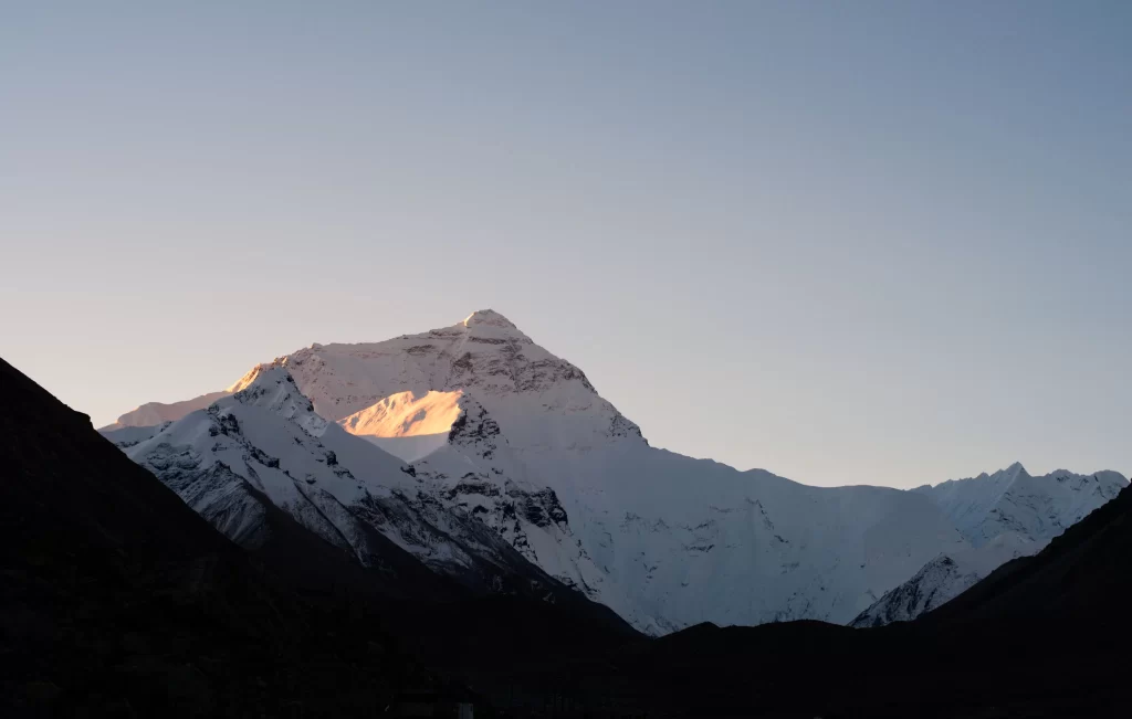 sunset golden snow peak ridge teal blue valley cyan